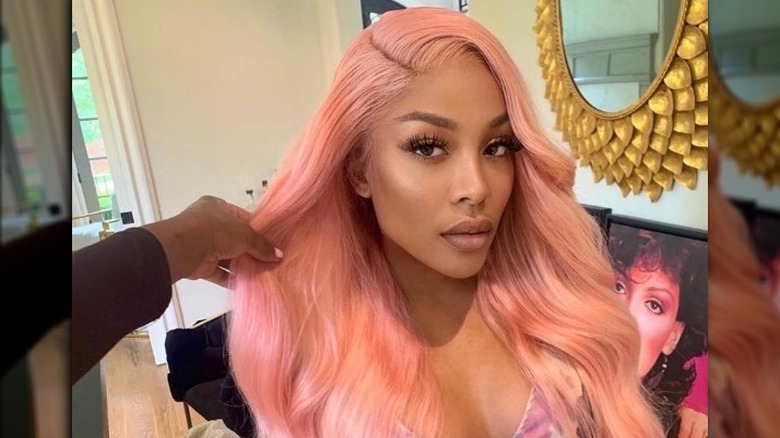 K Michelle wearing pink hair