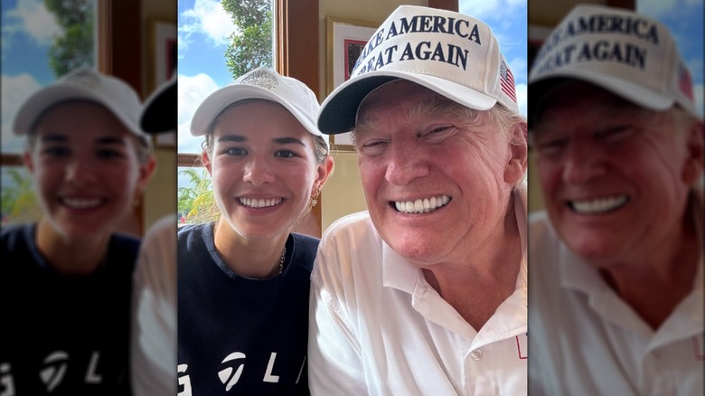 Kai and Donald Trump pose together for a selfie.