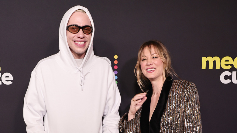 Kaley Cuoco and Pete Davidson pose 