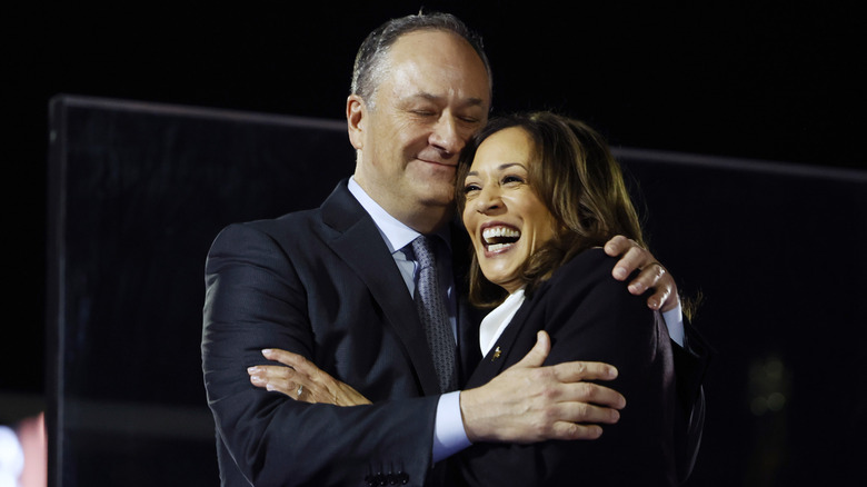 Doug Emhoff cuddling Kamala Harris