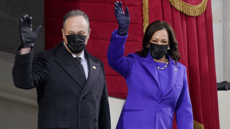 Kamala Harris and Douglas Emhoff waving