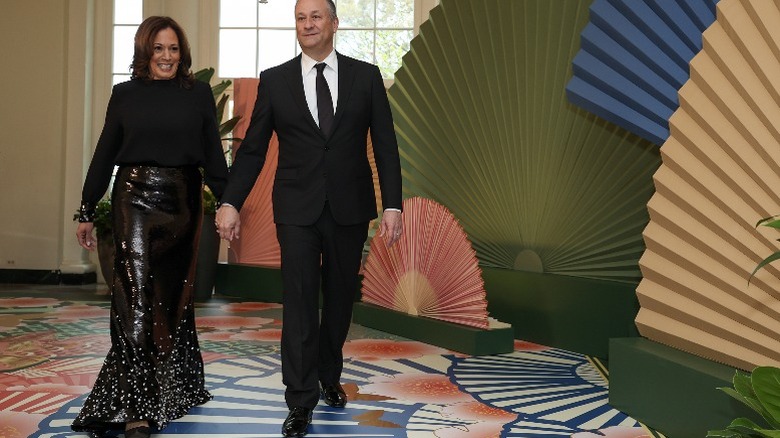 Kamala Harris and Doug Emhoff arrive at the White House for a state dinner (2024)