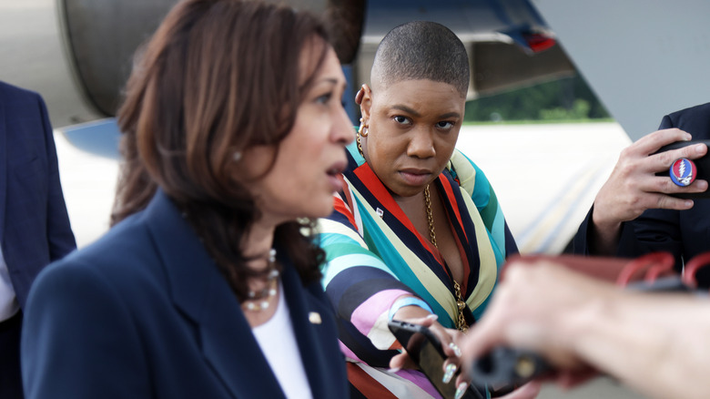 Symone Sanders staring at Kamala Harris