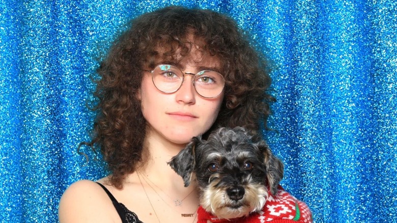 Ella Emhoff glasses holding dog