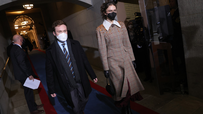 Cole and Ella Emhoff walking together