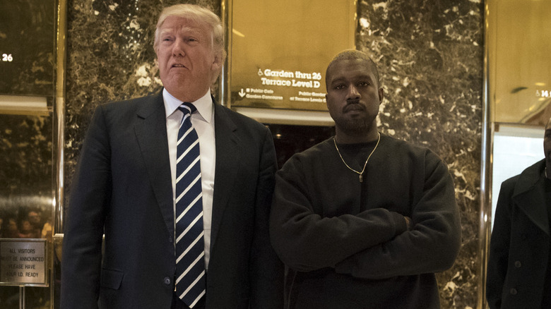 Kanye West posing with Donald Trump