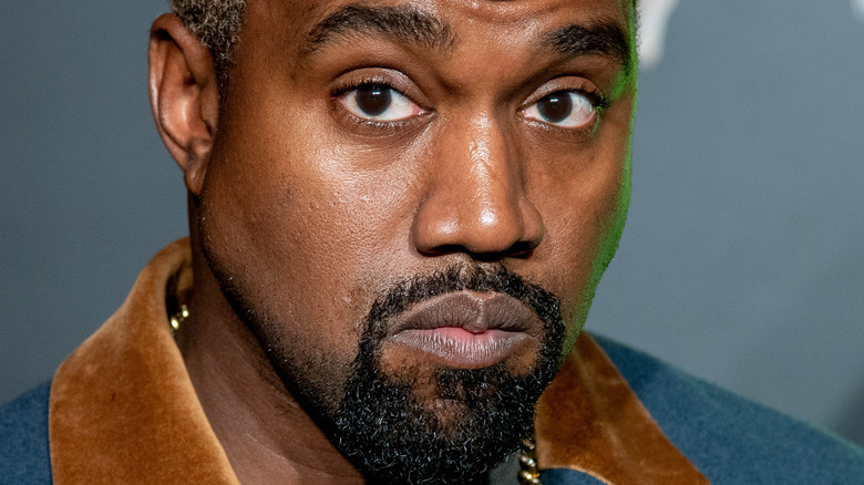 Kanye West frowning