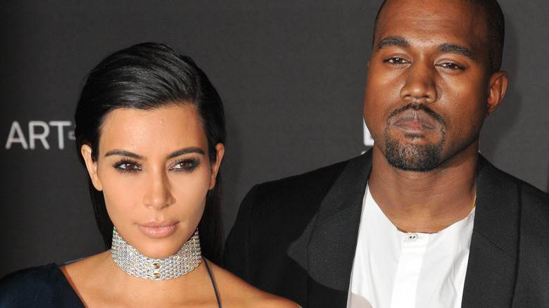 Kanye West and Kim Kardashian pose for photo