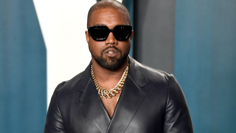 Kanye West, wearing sunglasses