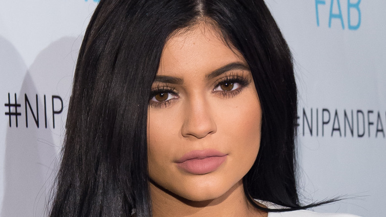 unsmiling Kylie Jenner