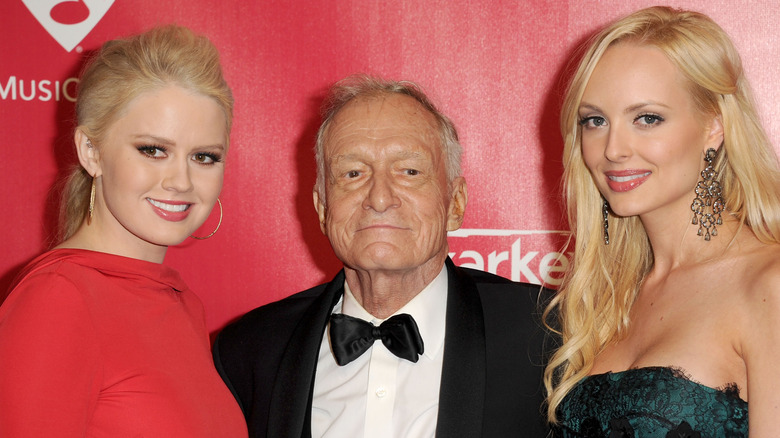 Karissa and Kristina Shannon with Hugh Hefner