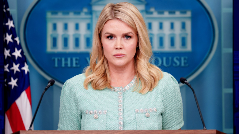 Karoline Leavitt wearing a mint green dress