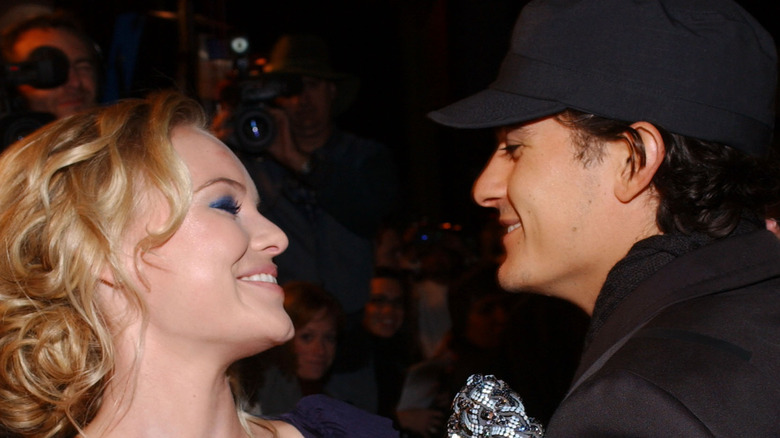 Kate Bosworth and Orlando Bloom smile at each other