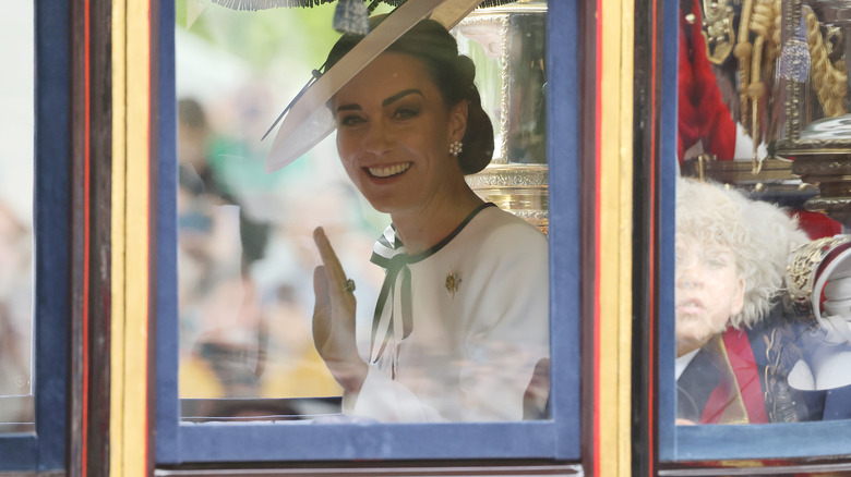 Kate Middleton waving from carriage