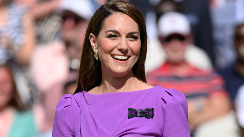 Kate Middleton wearing a purple dress