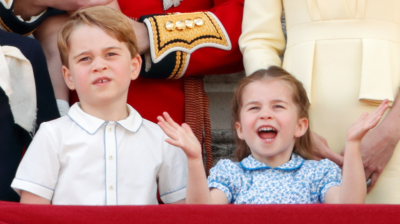 rince George of Cambridge and Princess Charlotte of Cambridge watching a flypast