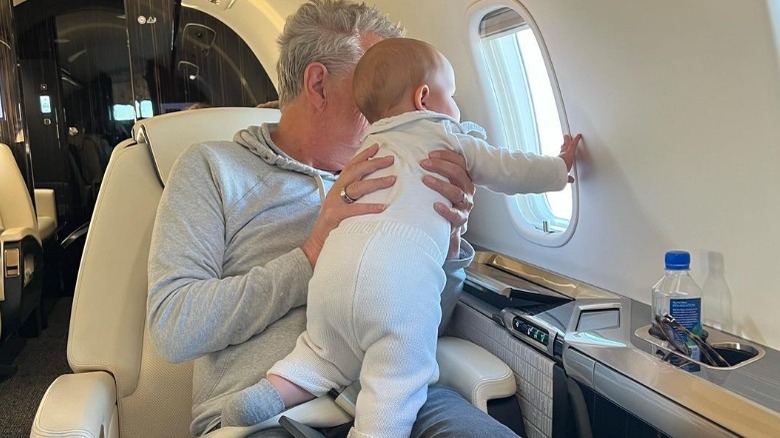 David Foster holding son Rennie