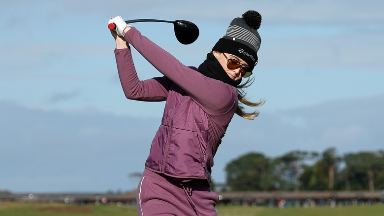 Kathryn Newton golfing