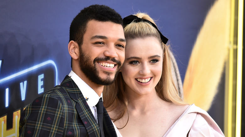 Justice Smith and Kathryn Newton grinning