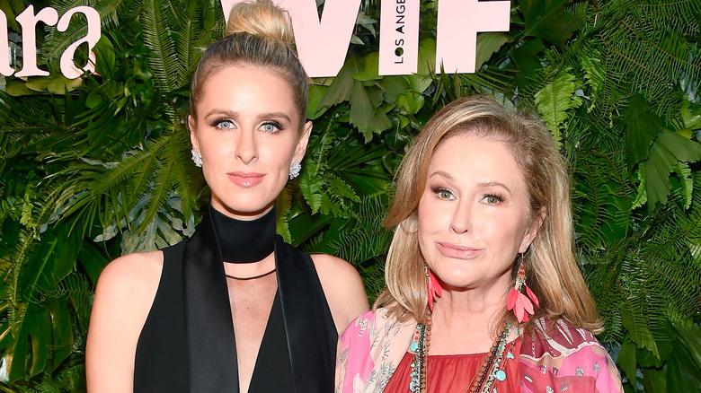 Nicky Hilton and Kathy Hilton posing