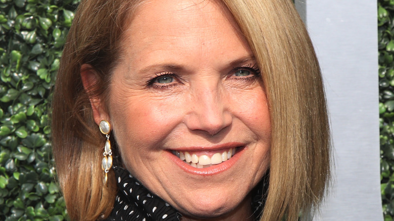 Katie Couric smiles at an event