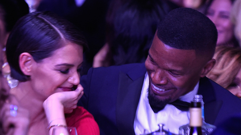 Katie Holmes and Jamie Foxx laughing