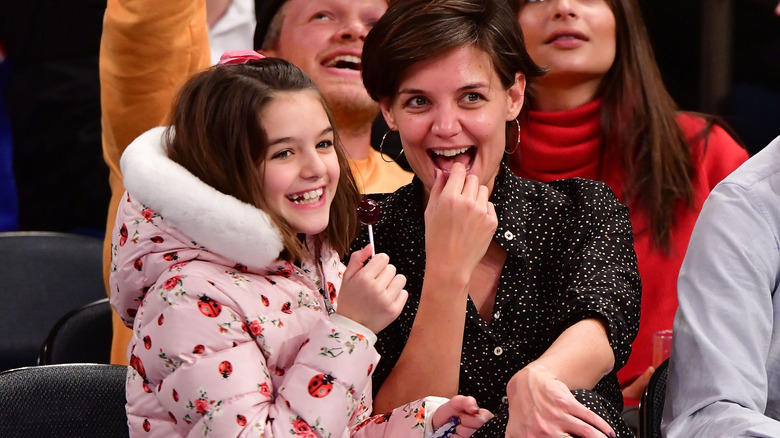 Katie Holmes and Suri Cruise attend a basketball game in 2017