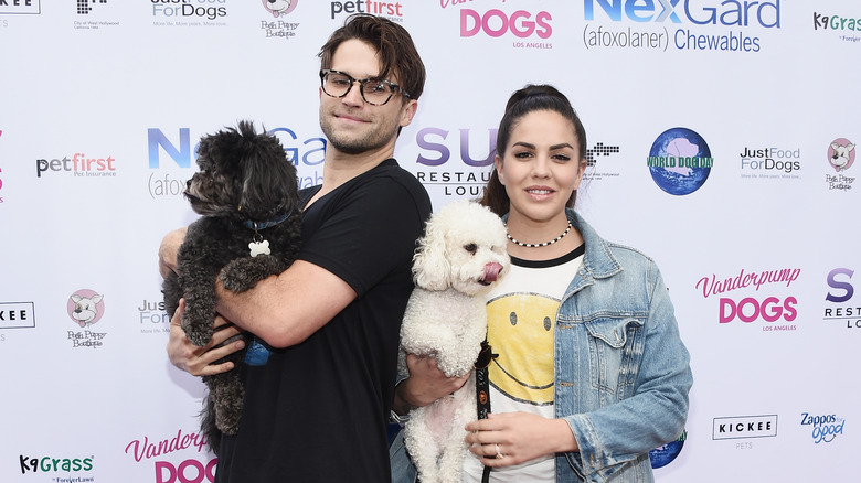 Tom Schwartz and Katie Maloney and their dogs attending event together