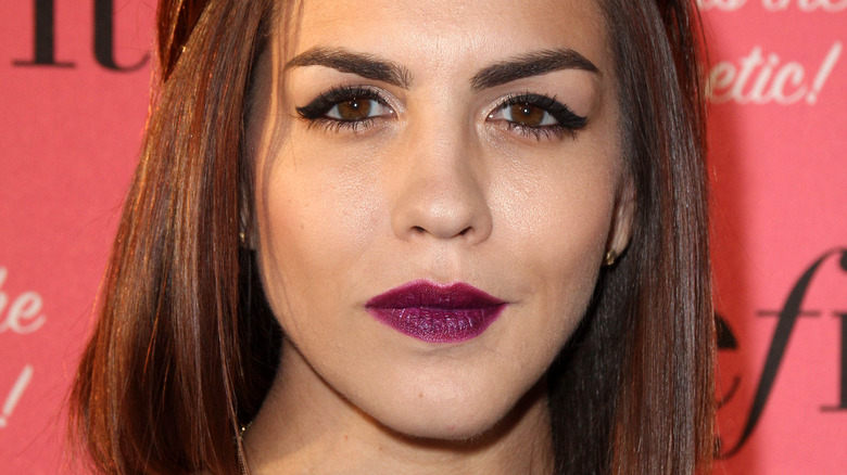Katie Maloney purple lipstick