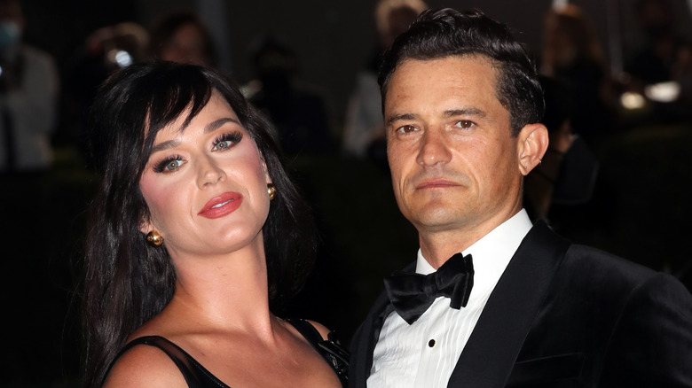 Katy Perry Leaning back from Orlando Bloom