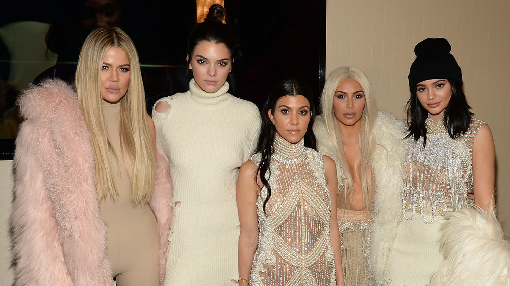 The Kardashian girls pose at the Kanye West Yeezy show in 2016