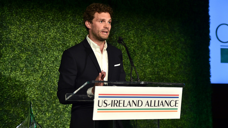 Jamie Dornan speaking at an event