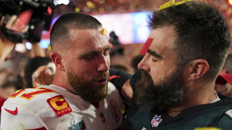 Travis Kelce, Jason Kelce embracing