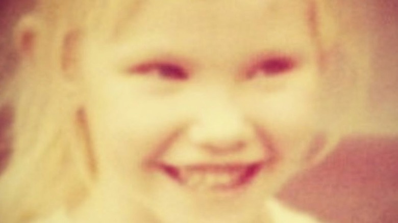 Kelli Giddish as a child