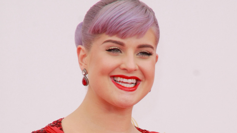 Kelly Osbourne smiling