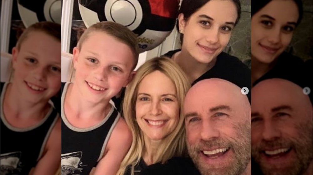 Kelly Preston, John Travolta, and two of their children