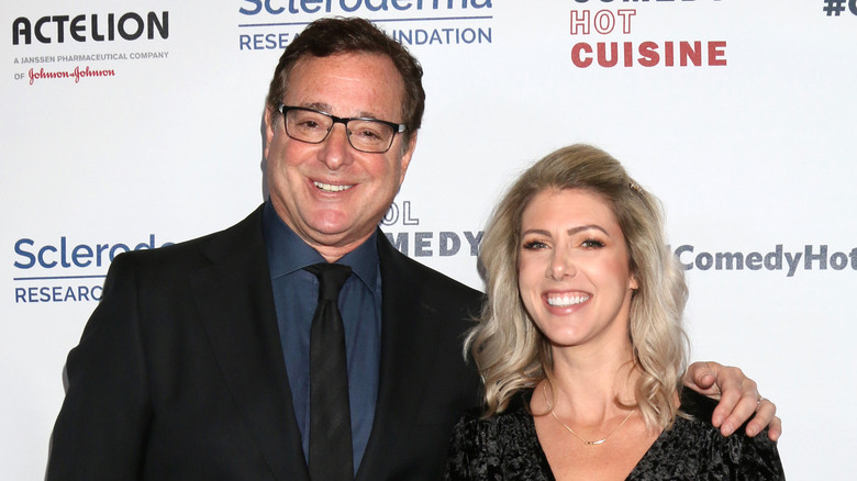 Bob Saget and Kelly Rizzo pose 