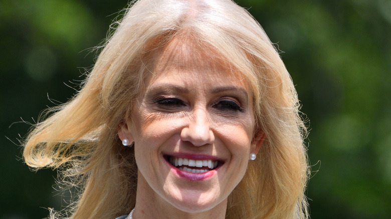 Kellyanne Conway smiles outside the White House