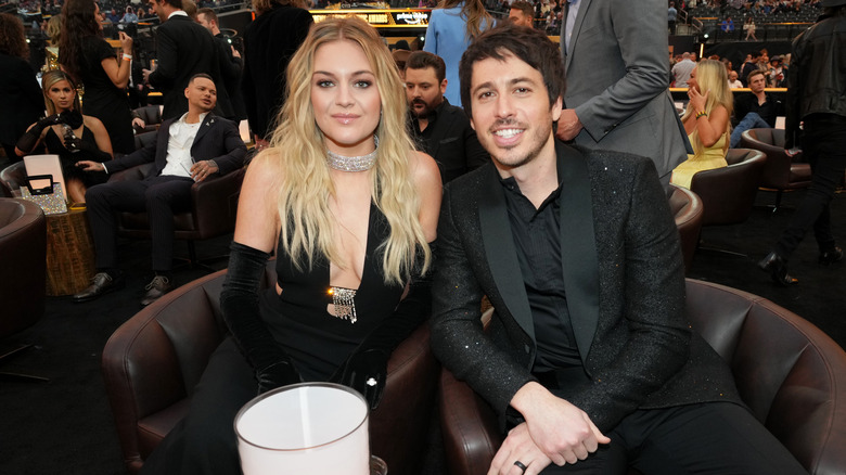 Kelsea Ballerini and Morgan Evans sitting