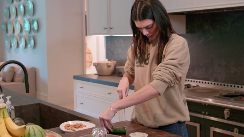 Kendall jenner chopping cucumber on the kardashians 