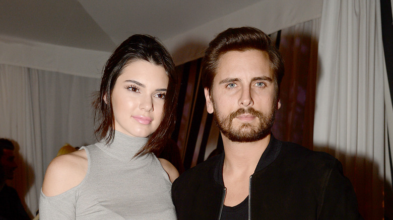 Scott Disick and Kendall Jenner pose 