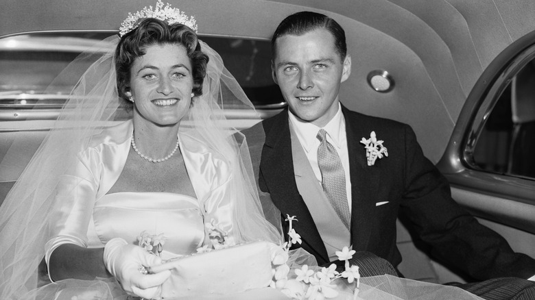 Jean Kennedy posing with Stephen Smith in car