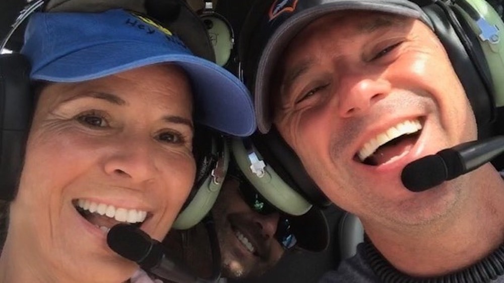 Kenny Chesney and Maria Rodriguez flying