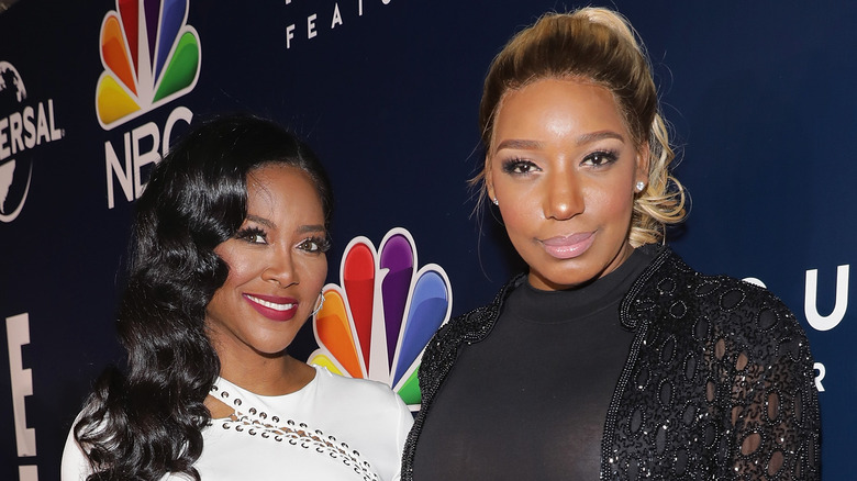 Kenya Moore and NeNe Leakes posing together