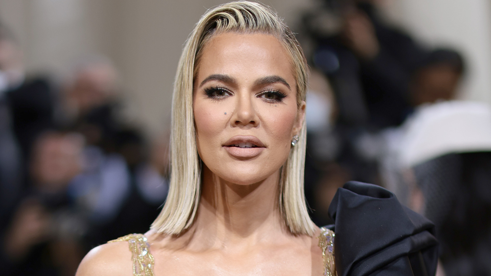 Khloé Kardashian's Troubling Health History With Melanoma Explained