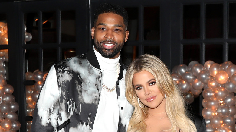 Tristan Thompson smiling Khloe Kardashian blonde hair