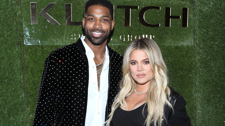 Tristan Thompson and Khloé Kardashian posing