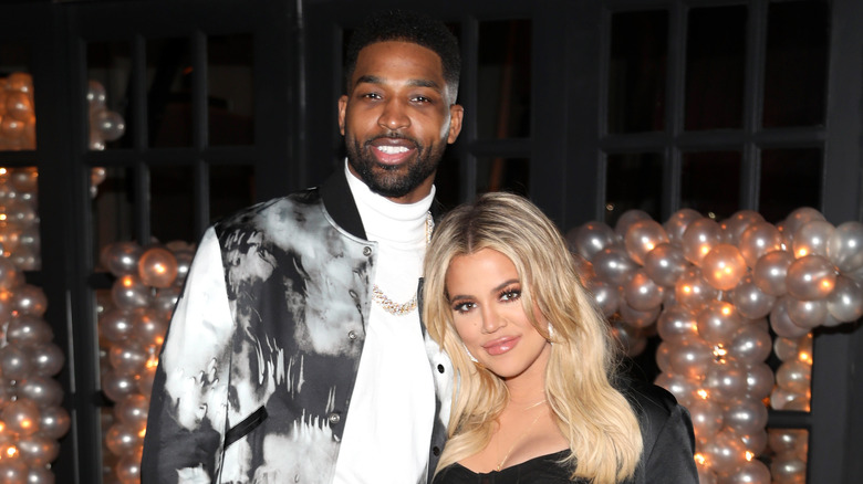 Tristan Thompson posing with Khloe Kardashian