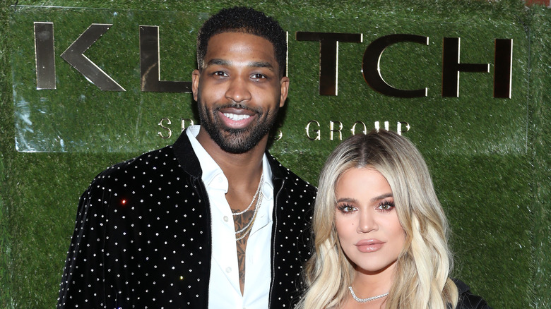 Tristan Thompson posing with Khloe Kardashian