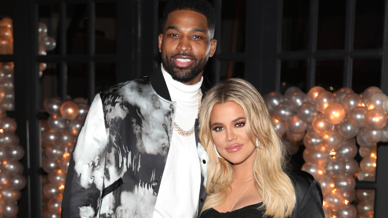 Tristan Thompson and Khloe Kardashian pose for a photo as Remy Martin celebrates Tristan Thompson's Birthday